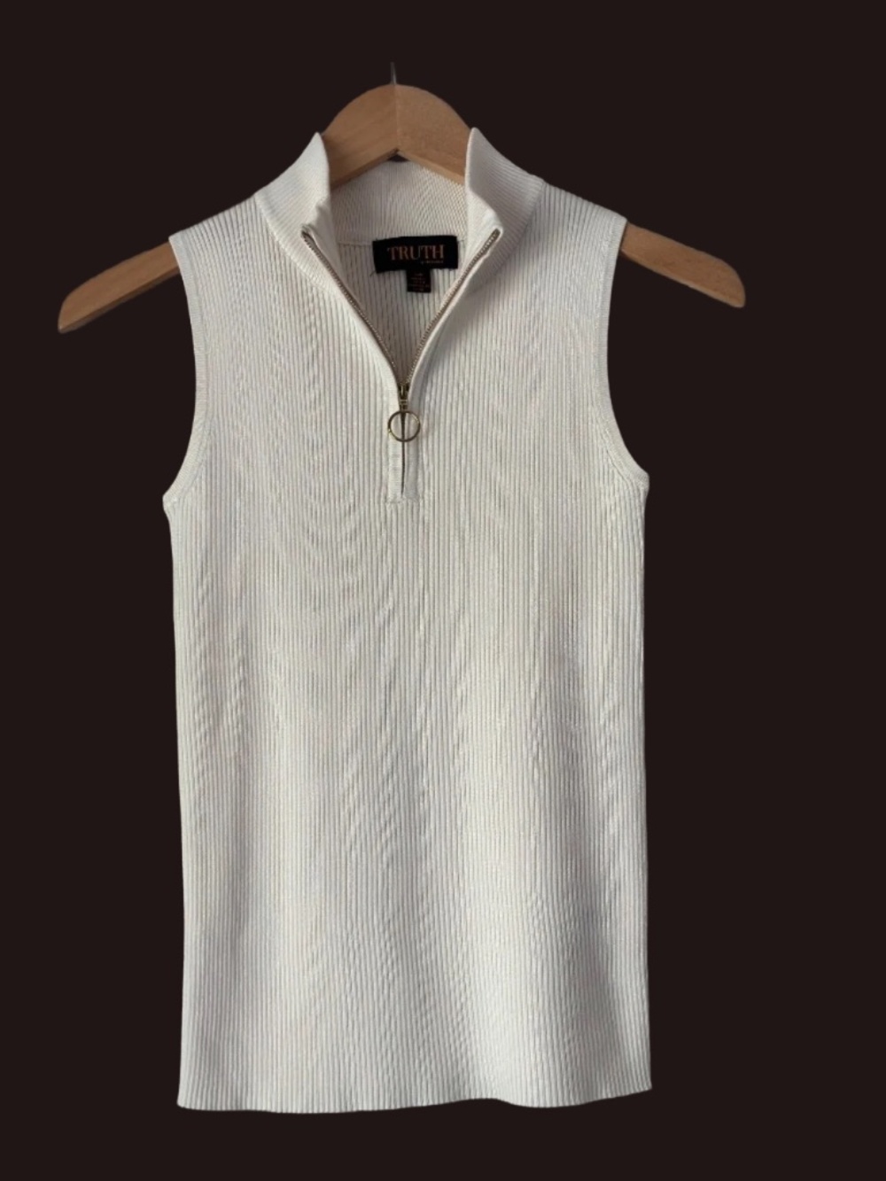 Truth Sleeveless 1/2 zip top.  Very cute.  Never worn!